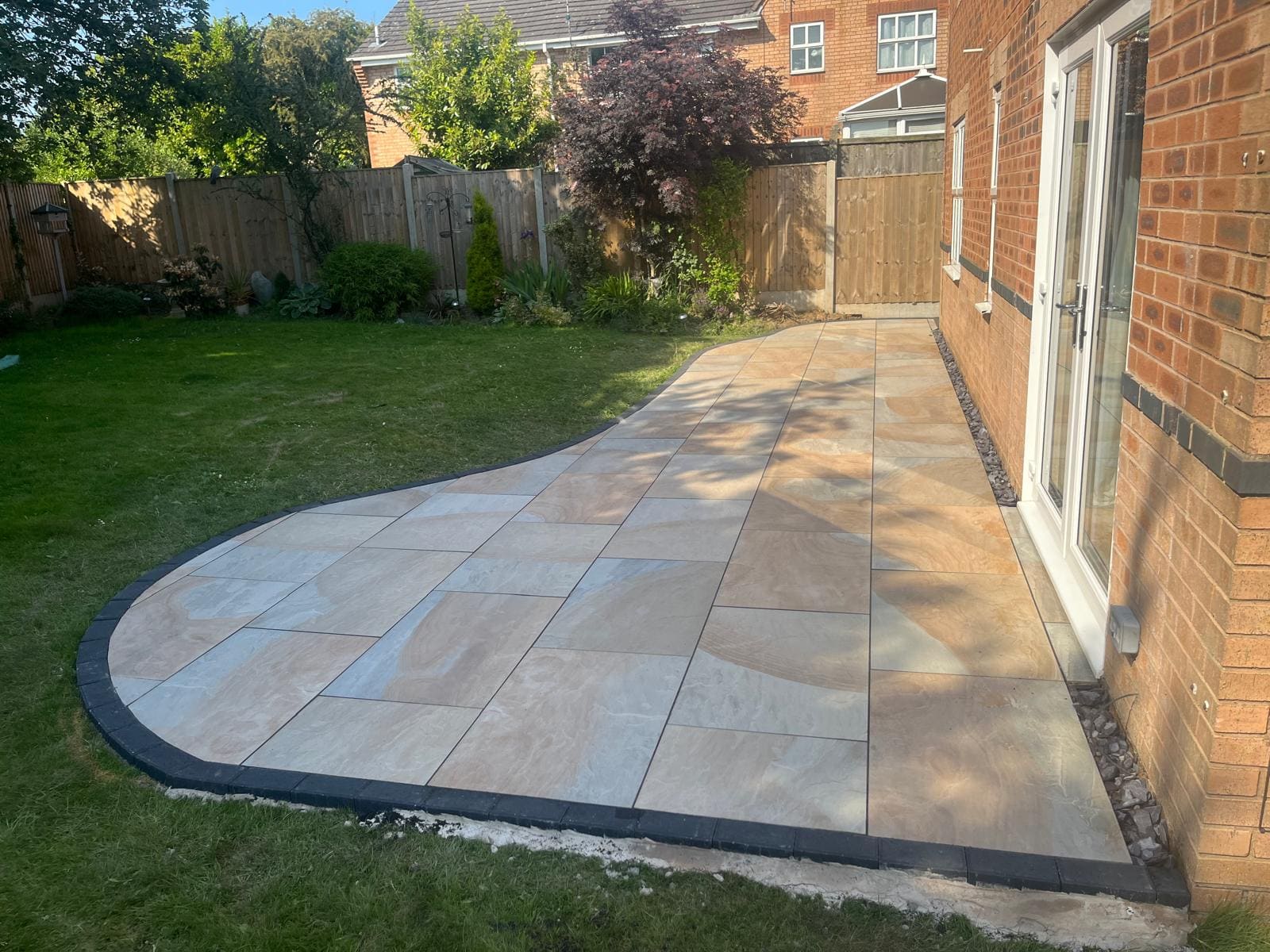 Curved sandstone patio