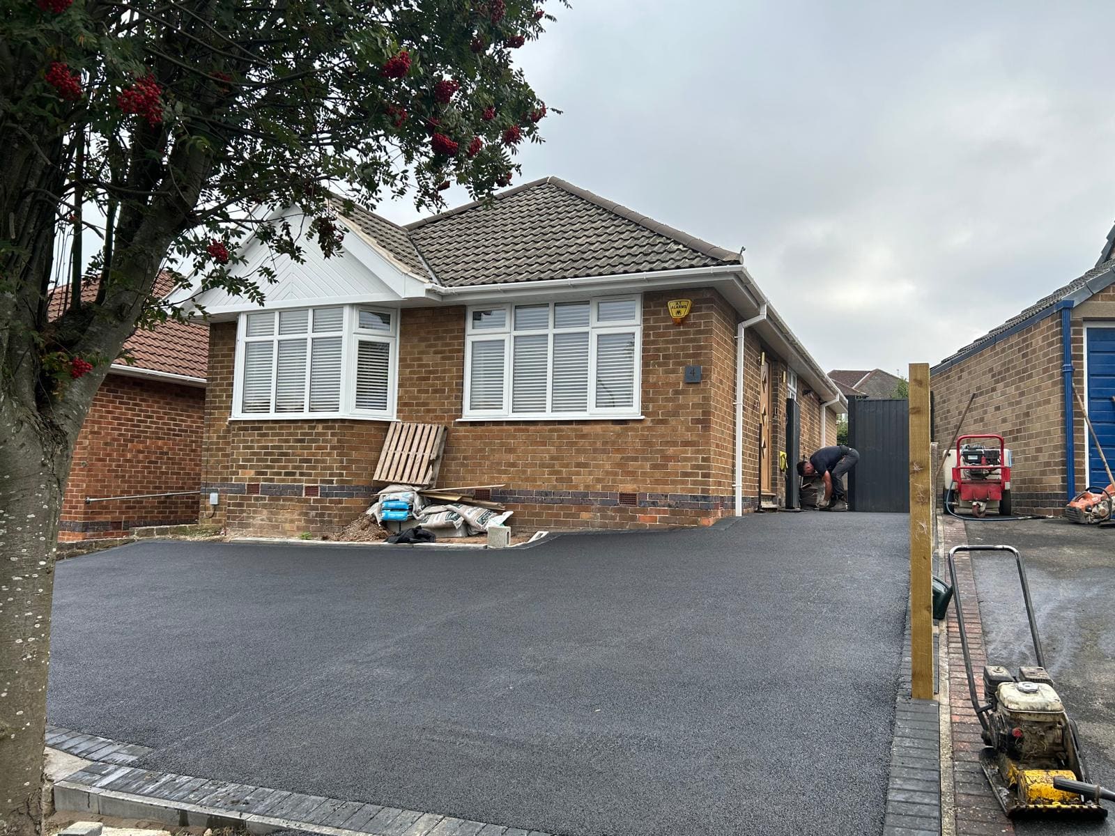 Tarmac driveway tree lined